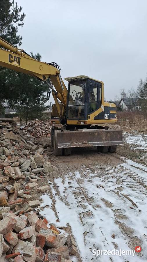 Koparka kołowa cat m315 zamiana Rakownia