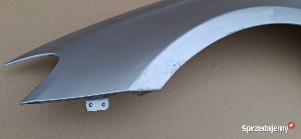MERCEDES EKLASA EQPOWER W213 BŁOTNIK LEWY PRZÓD Bieleń