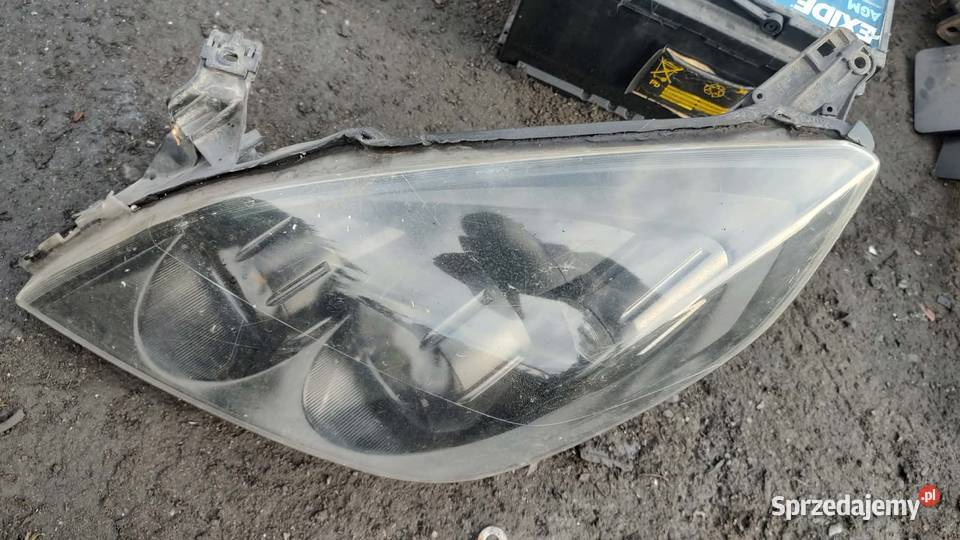 Reflektor lampa lewa prawa przód przednia Opel osobowe Oświetlenie wielkopolskie Książ Wielkopolski