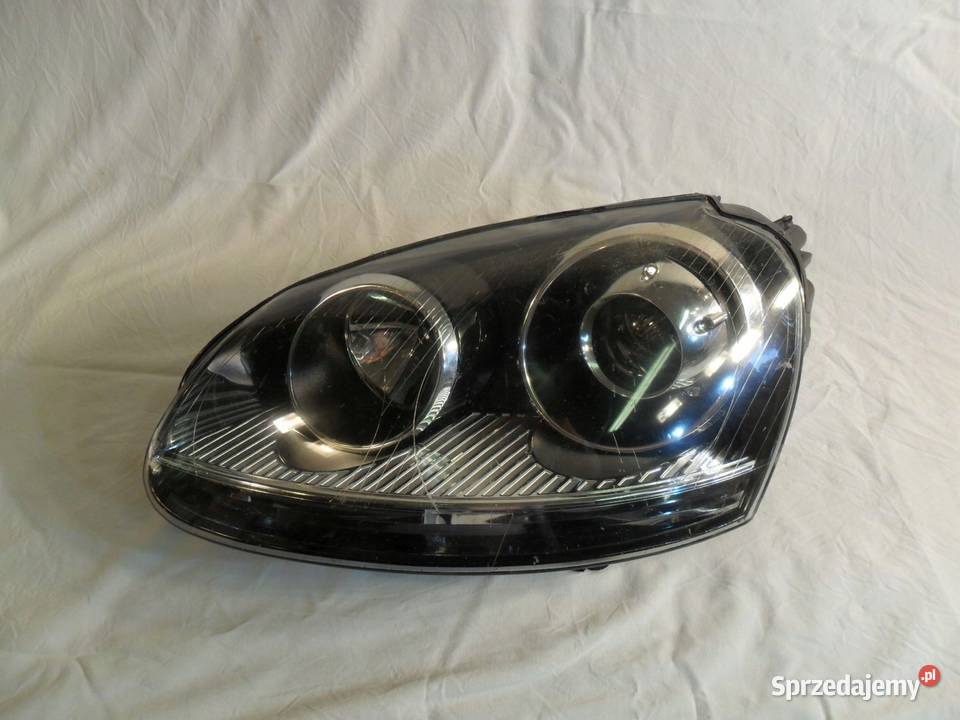 Reflektor Volkswagen Golf V przedni xenon lewy Lampy przednie Nowy Tomyśl sprzedam