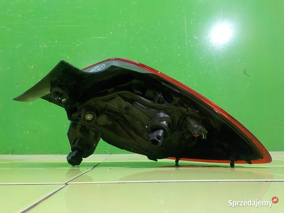 OPEL CORSA E 17r HB 3D lampa lewa tyl 39068625