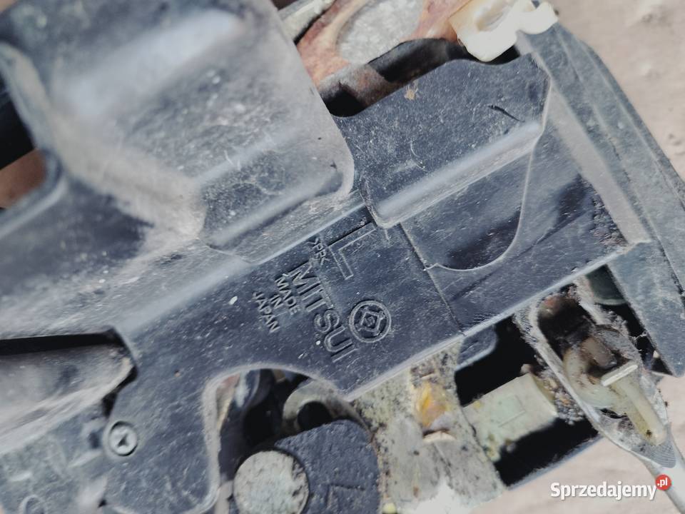 zamek drzwi lewy przód strona kierowcy Mazda Karoseria Kamień-Kolonia