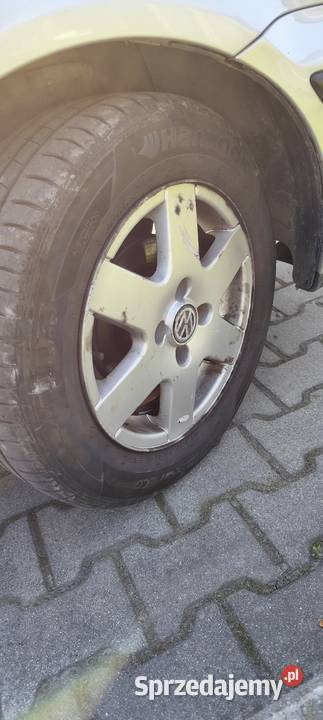 Koła felgi aluminiowe opony 14 letnie polo 6n2 Samochodowe