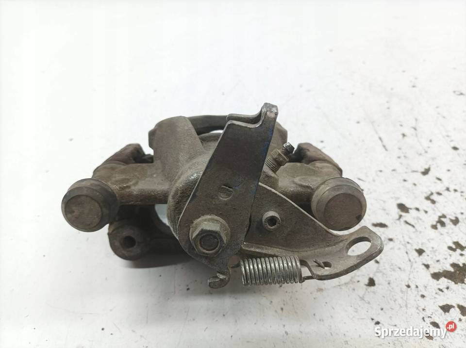 ZACISK HAMULCOWY LEWY TYŁ 23 DCI MOVANO B