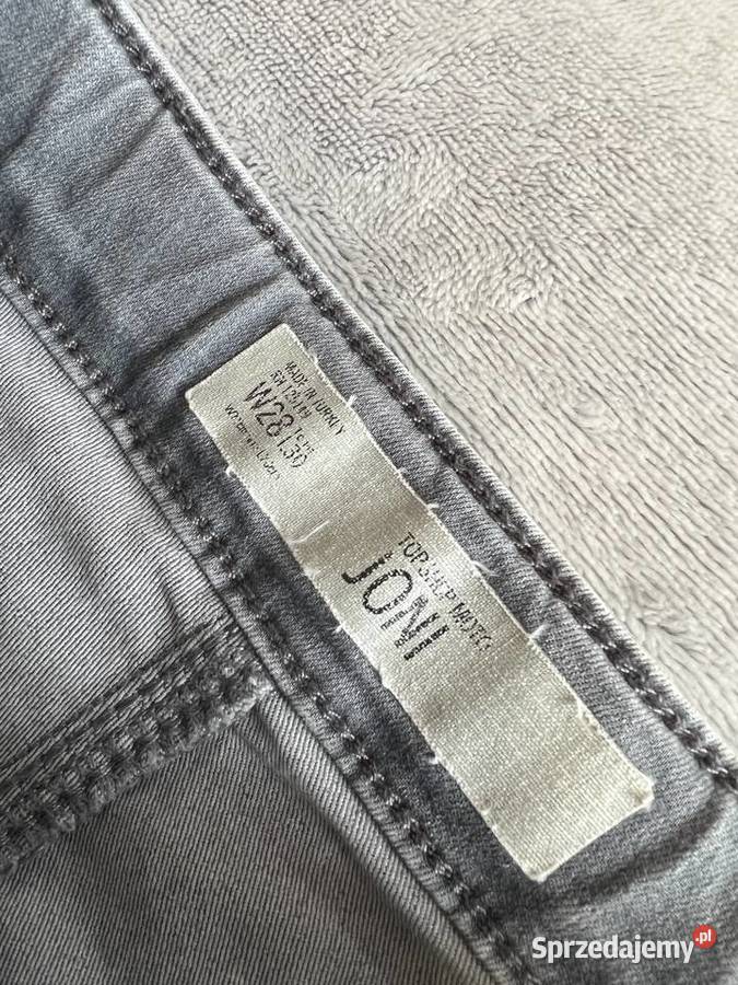Skinny jeansy dżinsy z rozdarciami rurki szare