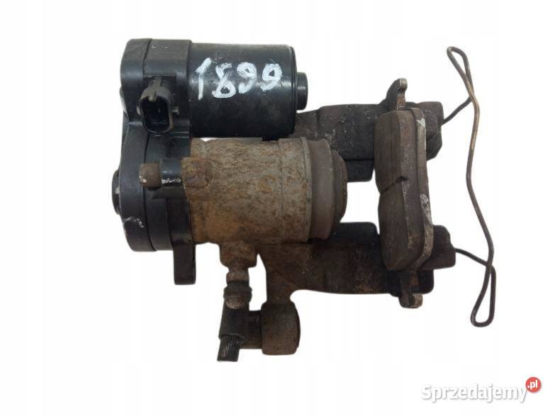 ZACISK HAMULCOWY PRAWY TYŁ 20 TDCI DG9C2D250H Rok produkcji 2015