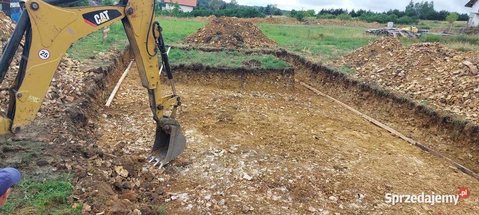 Wykopy pod fundament Usługi Koparko Ładowarka Wykopy, roboty ziemne Kalety