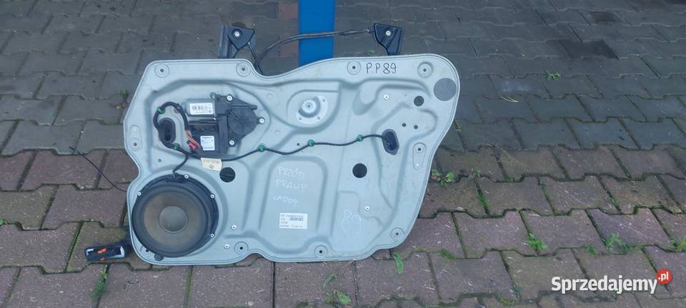 Podnośnik szyby prawy przód VW CADDY III Motoryzacja