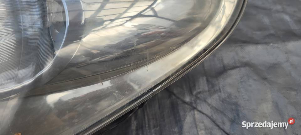 SUZUKI ALTO 0914 LEWY REFLEKTOR LAMPA LEWA PRZOD Ruda Śląska