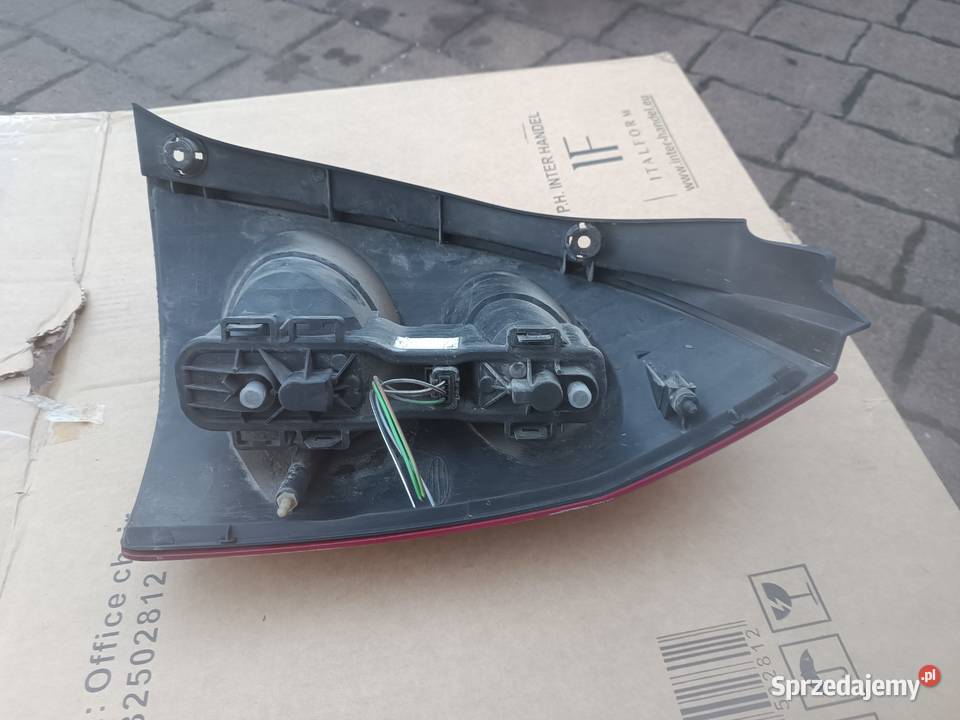 Nissan Primera P12 lampa lewy tył tylna lewa osobowe