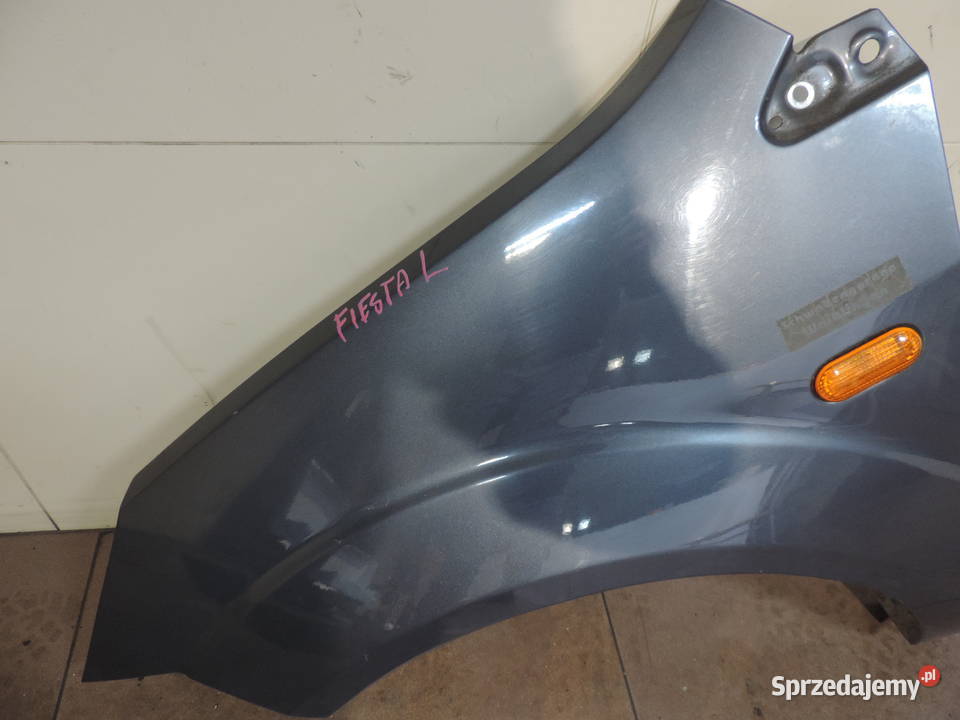 BŁOTNIK LEWY PRZEDNI PRZÓD FORD FIESTA MK5 MK6