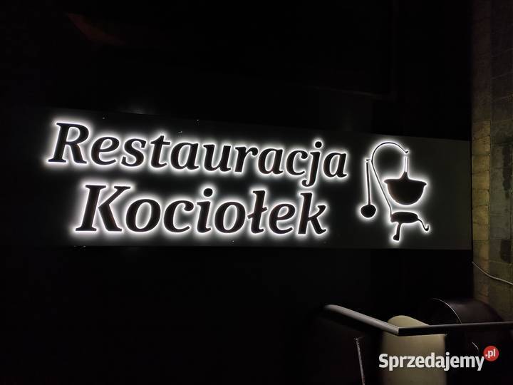 Restauracja Kociołek napis logo firmy Osprzęt oświetleniowy mazowieckie Warka