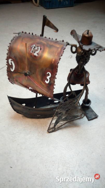 FIGURKA Z METALU HARRY ŁÓDKA ZEGAR