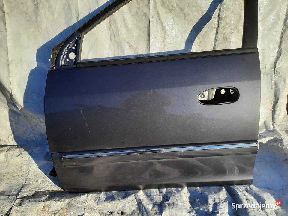Kia Carens II Drzwi lewe przednie lewy przód osobowe