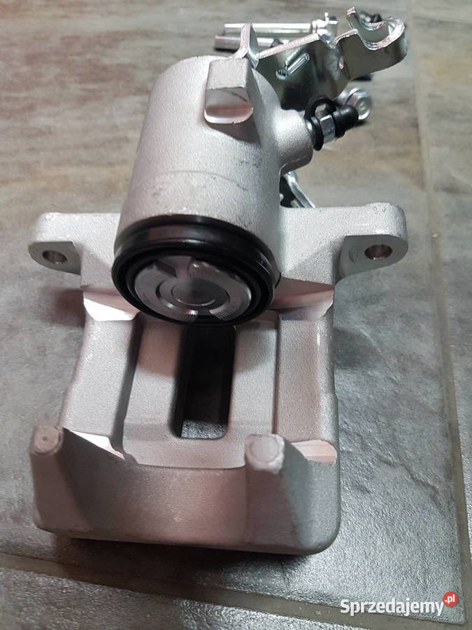 VW GOLF V TOURAN ZACISK HAMULCOWY TYL 1K0615424A Turek