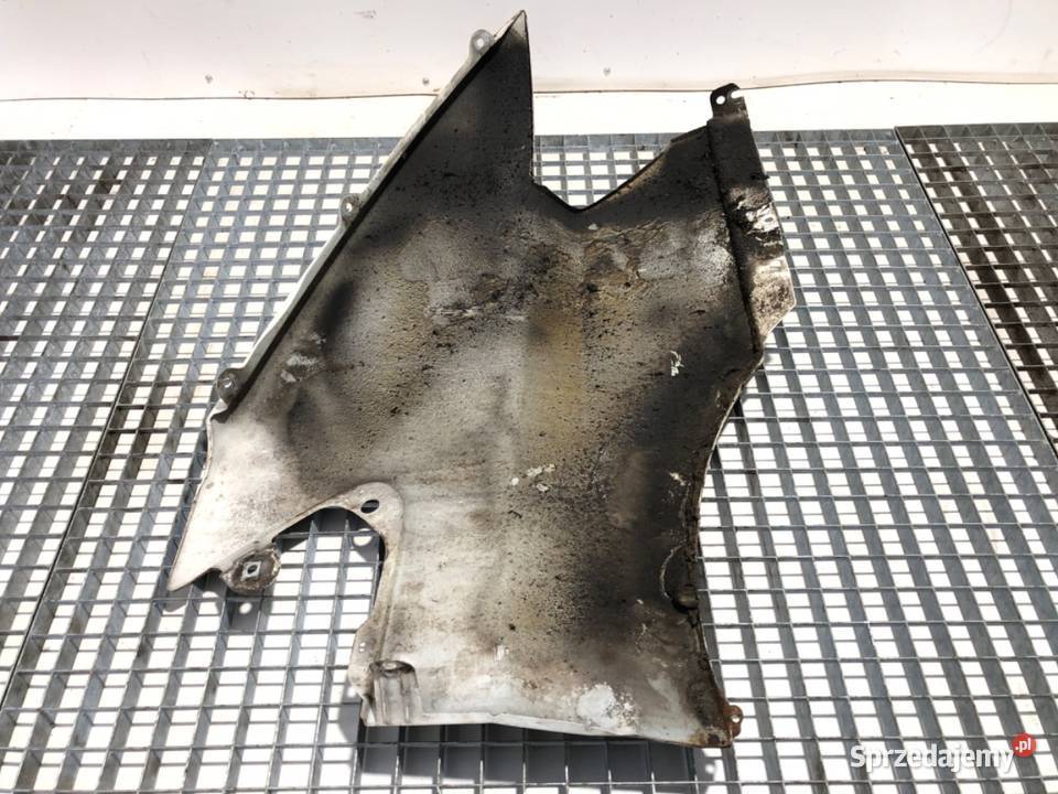 BŁOTNIK LEWY PRZÓD FORD TRANSIT IV Bus 0006