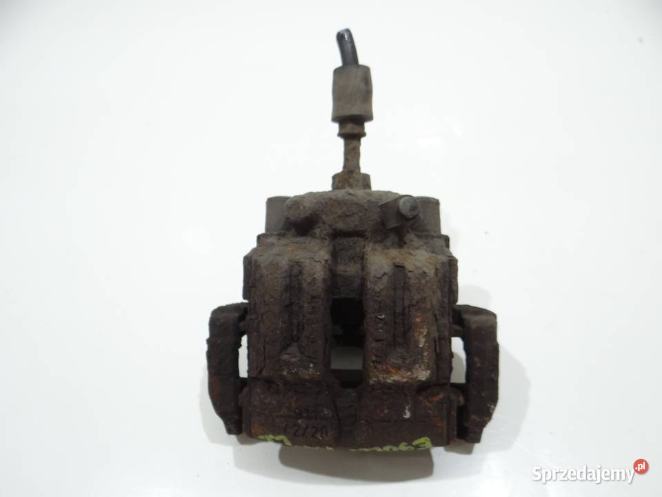 ZACISK HAMULCOWY LEWY TYŁ BMW E90 E91 LCI N47 Strzyżewice