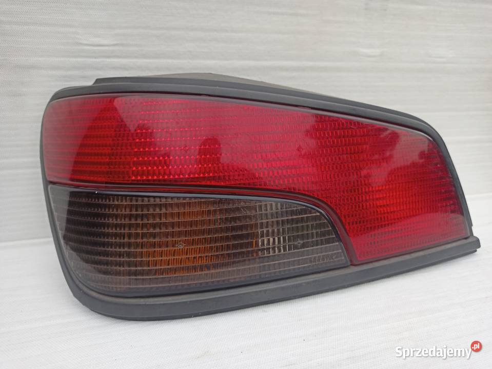 Peugeot 306 lampa tył tylna lewa wkład