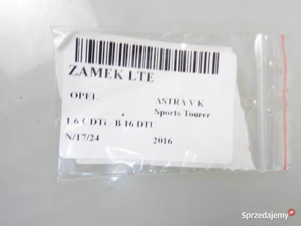 ZAMEK LEWY TYLNY OPEL ASTRA V K 915C303907318S
