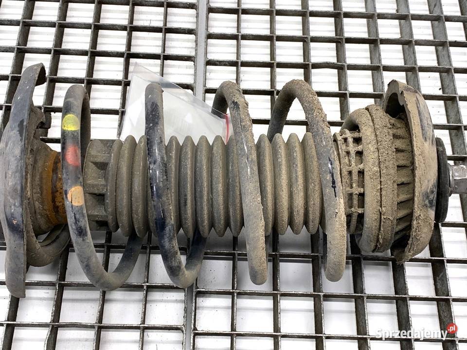 AMORTYZATOR LEWY PRZÓD ZE SPRĘŻYNĄ PEUGEOT 2008