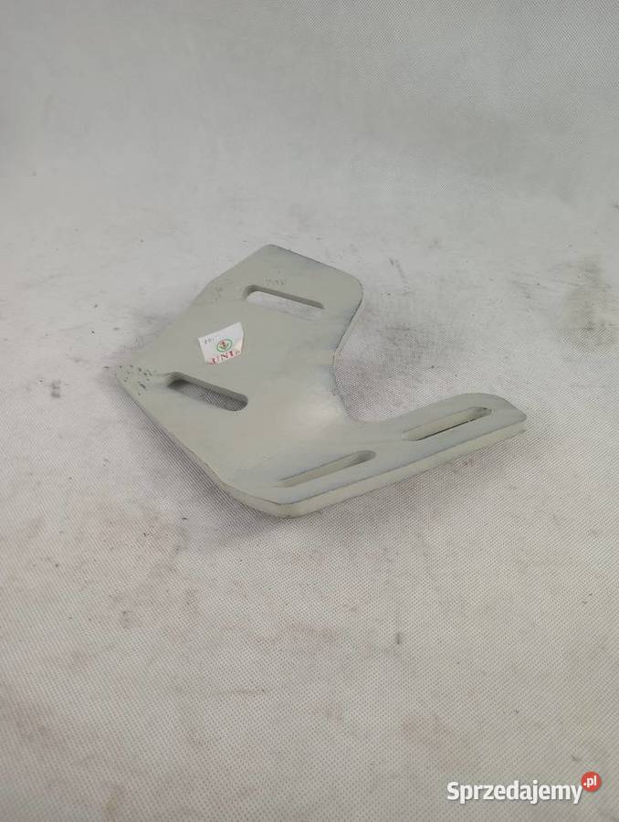 Uchwyt zgarniacza lewy 1126600060 333 UNIA