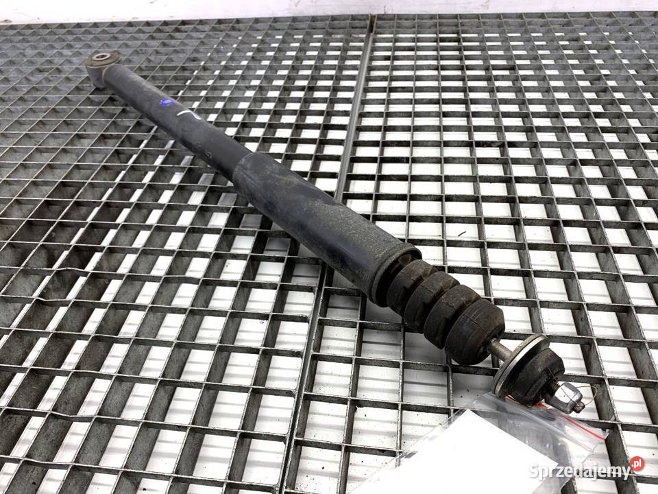 AMORTYZATOR LEWY TYŁ DACIA DUSTER SUV 562106321R