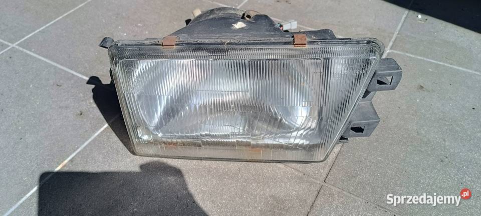 Reflektor Alfa Romeo 75 prawy osobowe śląskie Okrajnik