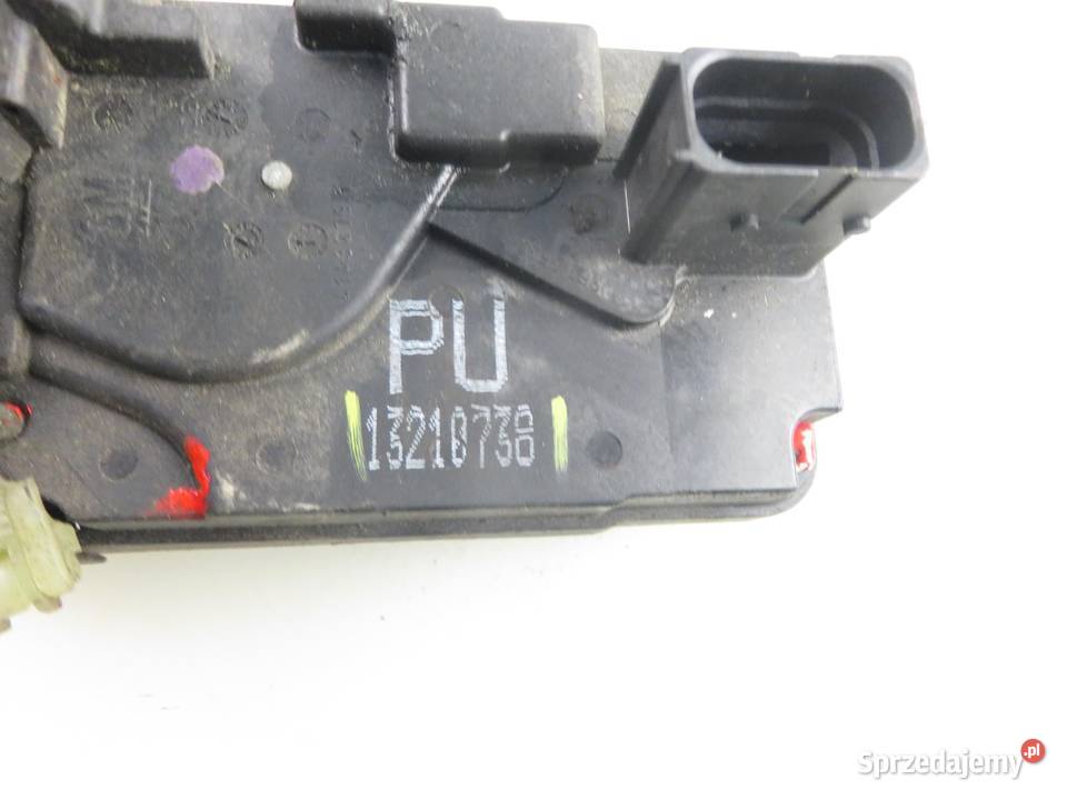 ZAMEK LEWY TYLNY OPEL ZAFIRA B 13210738 Motoryzacja