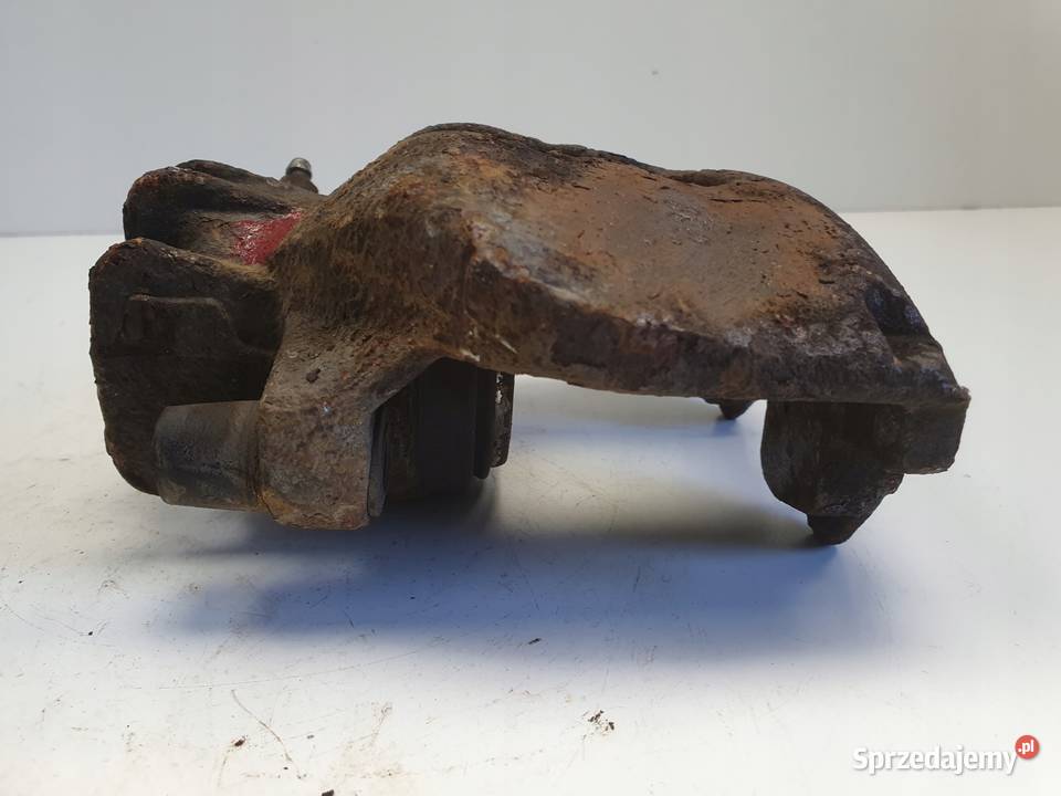 Volvo S60 I V70 II PRZEDNI ZACISK HAMULCOWY lewy Rudka