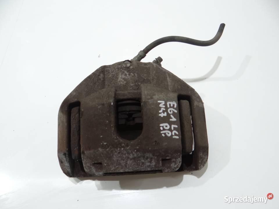 ZACISK HAMULCOWY PRAWY PRZÓD BMW E60 E61 N47 osobowe Strzyżewice