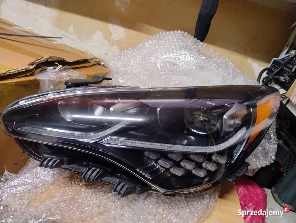 Reflektor lampa KIA Stinger lewa USA nowa Warszawa