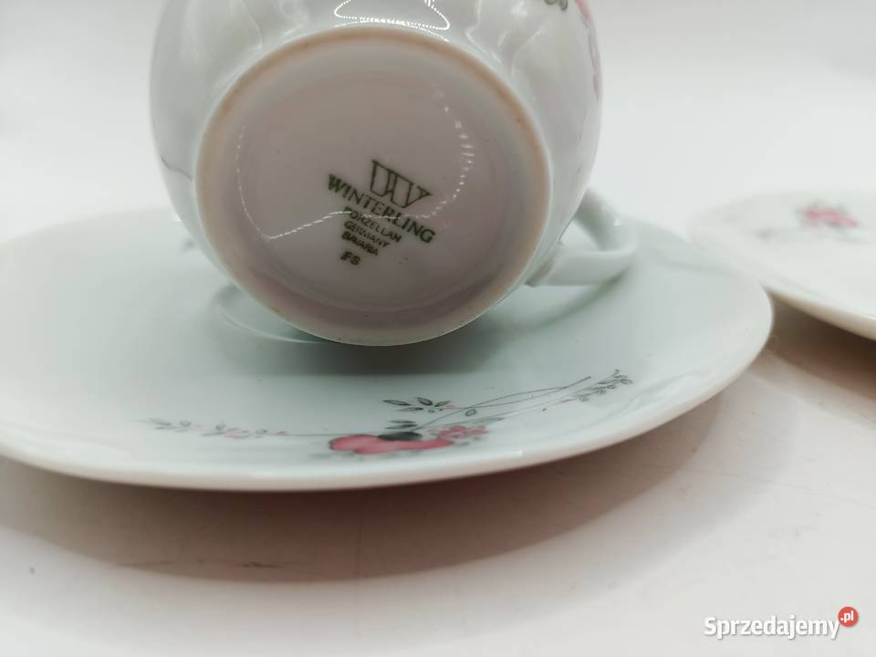 Filiżanka i dwa spodki biała porcelana