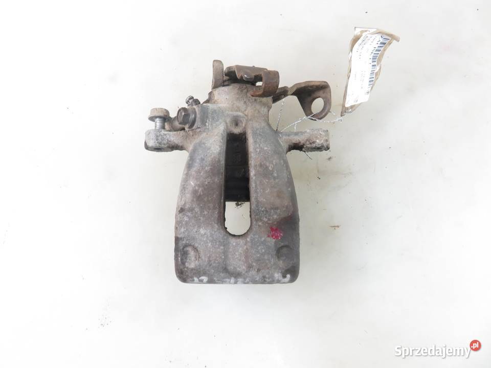 ZACISK LEWY TYŁ OPEL ZAFIRA B 16 Z 16 XEP osobowe