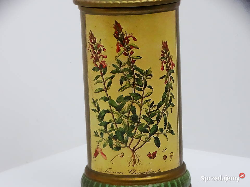 Zabytkowy pojemnik aptekarski z ilustracją