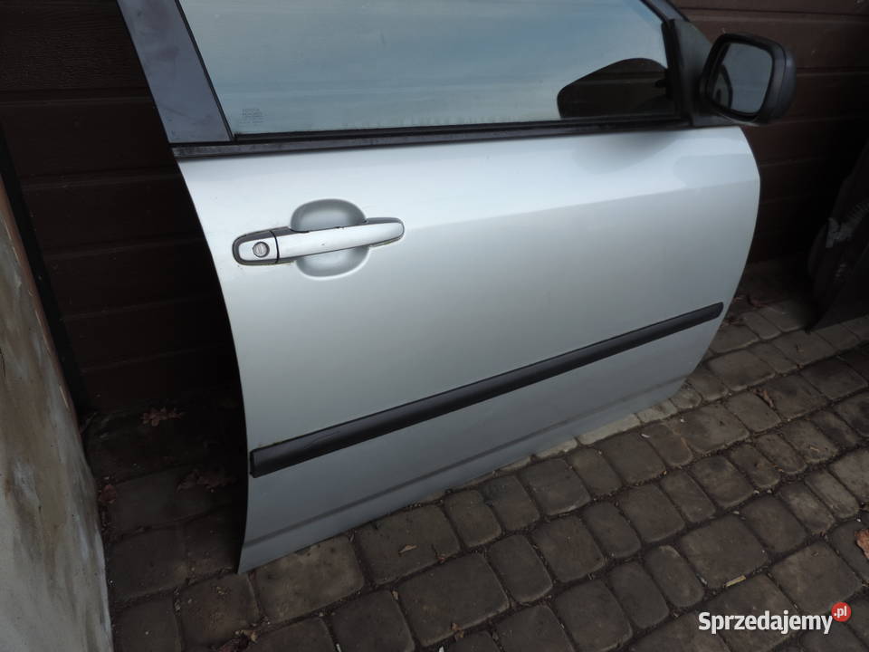 TOYOTA COROLLA E12 SEDAN DRZWI PRAWY PRZÓD 199 Rok produkcji 2003 Nowy Sącz