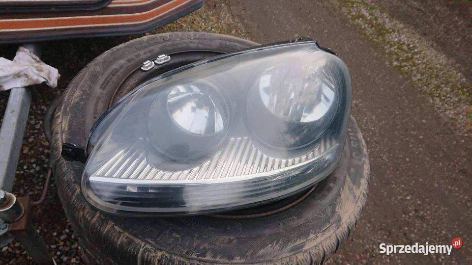 Oryginalna lampa przód Golf V czarny środek Lewa pomorskie Garcz