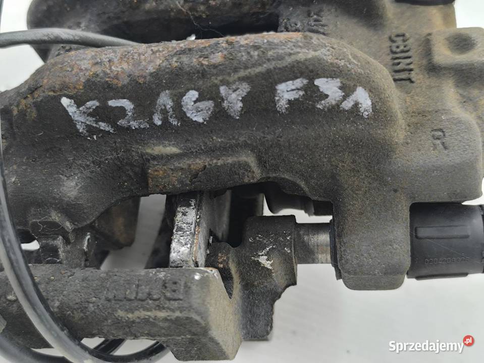 ZACISK PRAWY TYŁ BMW F31 20D LIFT osobowe