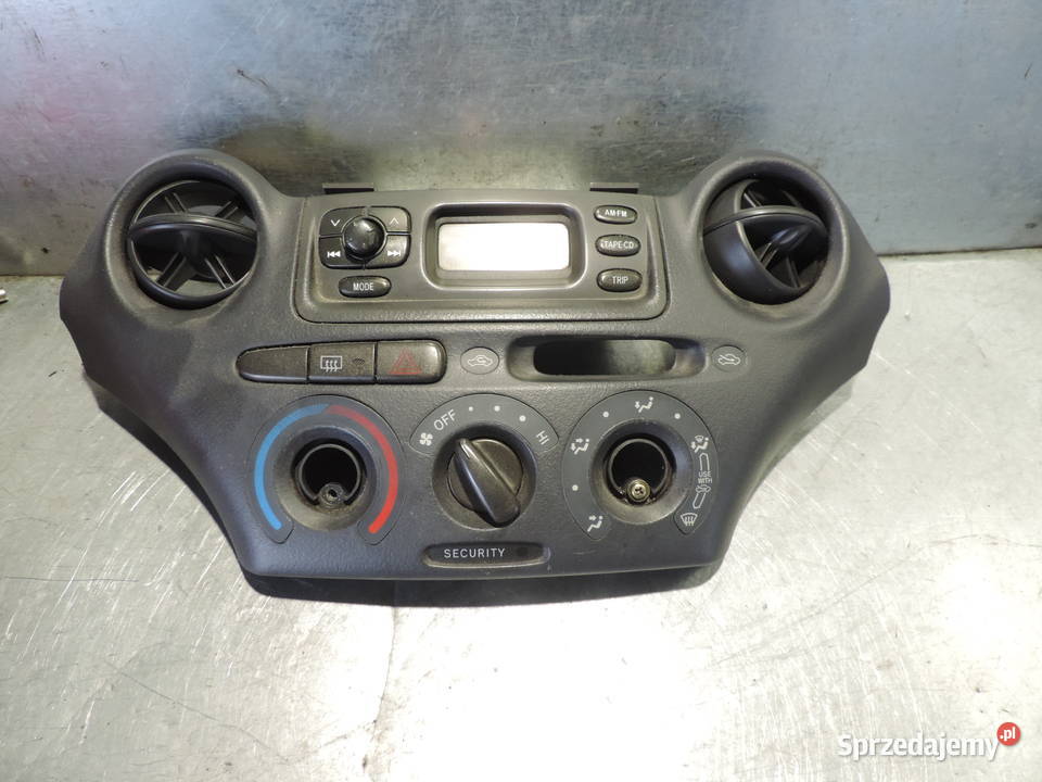 RADIO PANEL KLIMATYZACJI TOYOTA YARIS I Panele sterowania, przełączniki Nowy Sącz