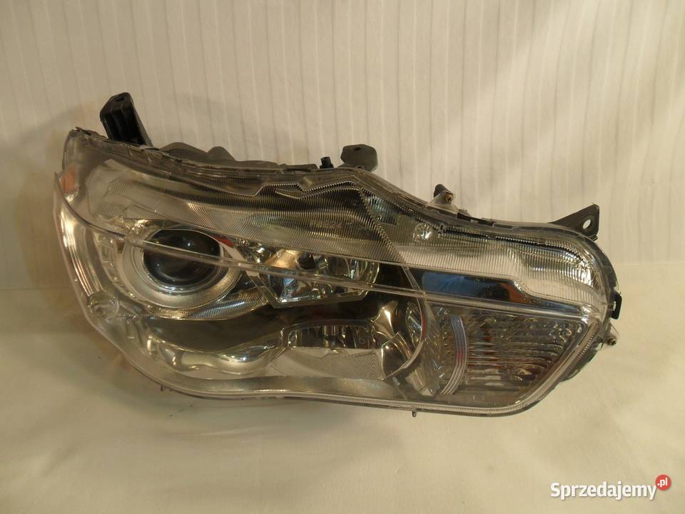 LAMPA PRAWY PRZÓD REFLEKTOR XENON EU MITSUBISHI Nowy Tomyśl