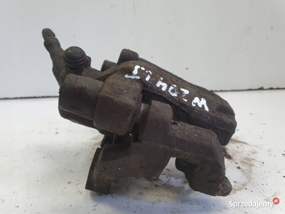 Mercedes W204 LEWY TYLNY ZACISK HAMULCOWY tył