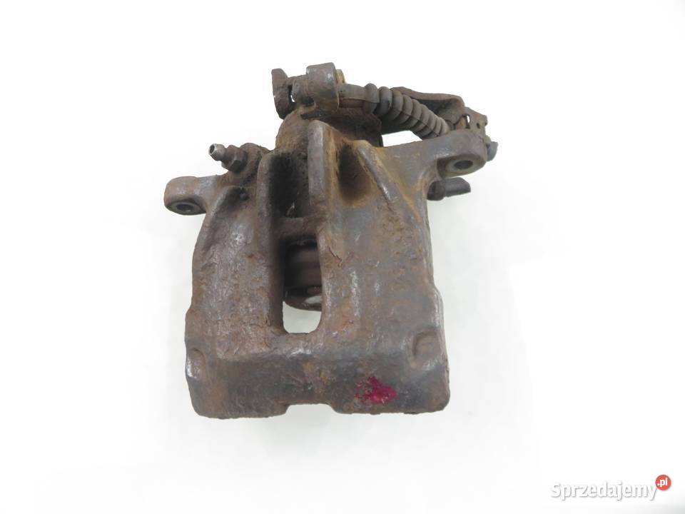 ZACISK LEWY TYŁ VW TRANSPORTER T4 19 TD