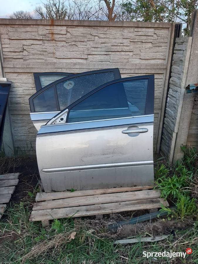 Kia Magentis II drzwi lewe przednie komplet 4 Łódź sprzedam