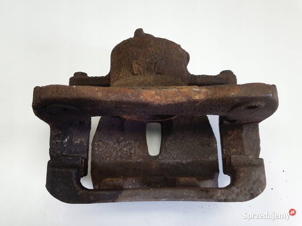 Toyota RAV4 IV III PRZEDNI ZACISK HAMULCOWY Rudka