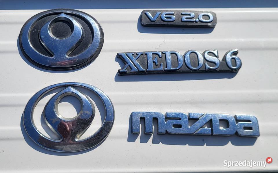 Mazda Xedos 6 V6 oryginalne emblematy komplet