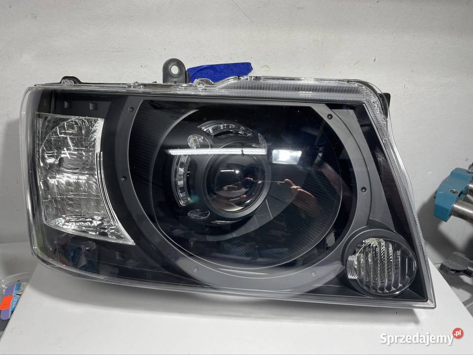 Reflektory Nissan Patrol Y61 GU4 biled Warszawa sprzedam