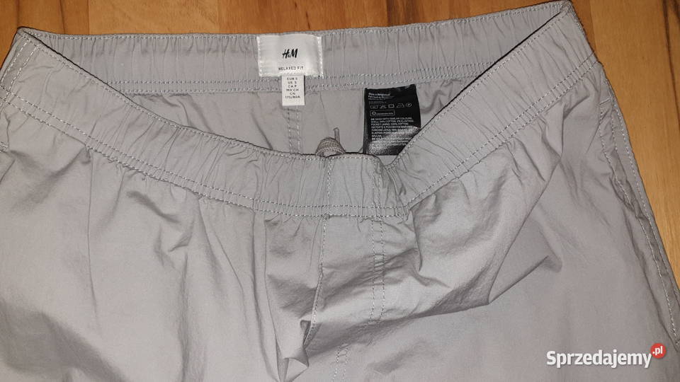 Spodnie HM typ relaxed fit szare r S 170 mazowieckie Warszawa
