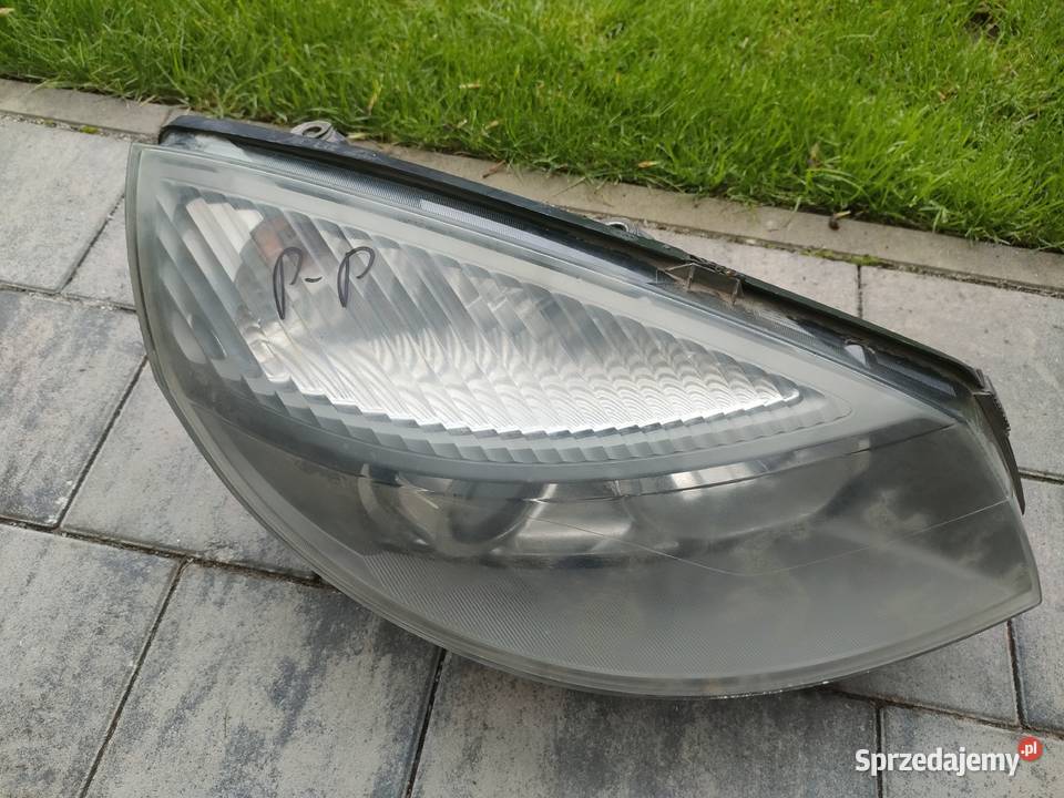 Scenic II lampa prawy przód XENON Swarzędz