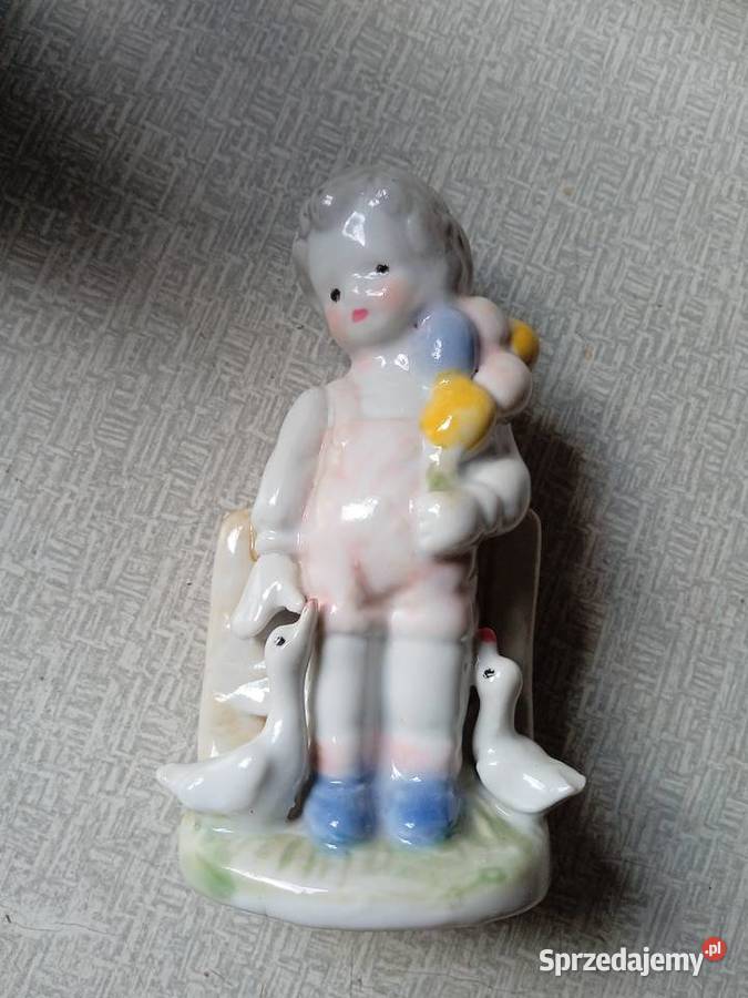 Porcelanowa figurka chłopiec z balonami i kaczki