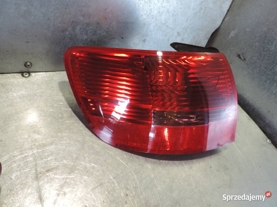 LAMPA LEWY TYŁ AUDI A6 C6 KOMBI AVANT