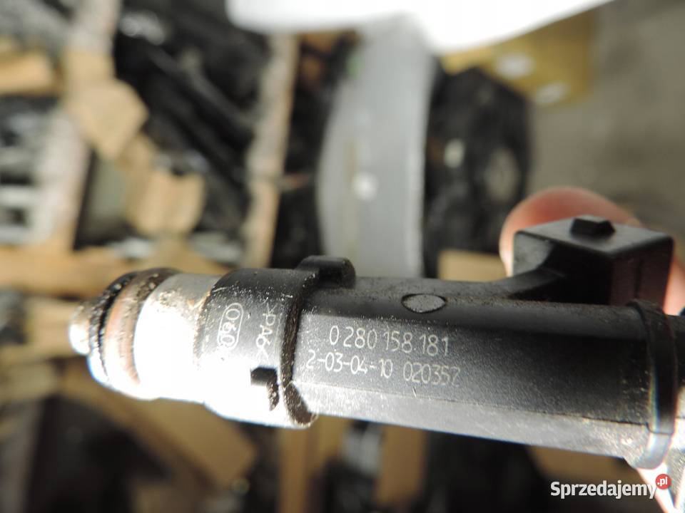 OPEL CORSA D 14 A14XER LISTWA WTRYSKOWA 55562258